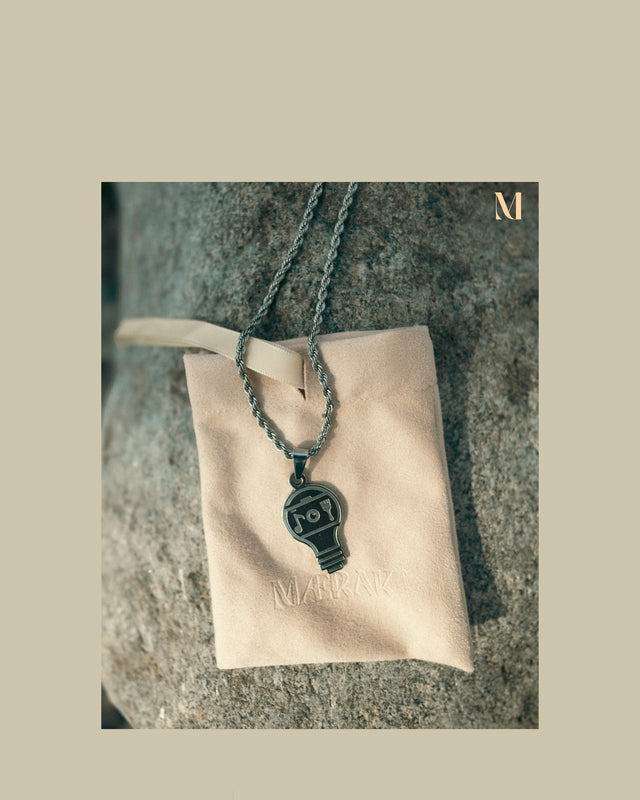 MÆRAK Artisans Hoodie styled with the included MÆRAK necklace